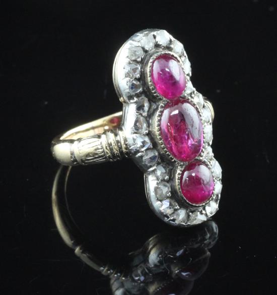 A Victorian gold and silver, cabochon ruby and rose cut diamond set up-finger ring, size G.